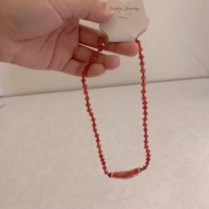 Red bead golden accent necklace